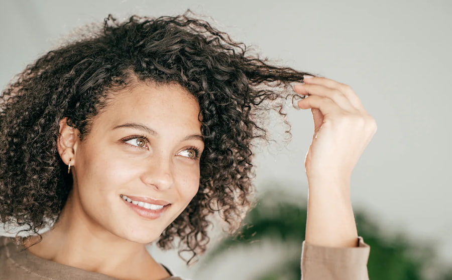 Biotin supplement bottle, hair growth support