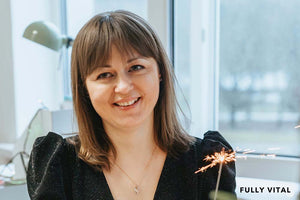 Smiling woman with bangs for round faces