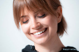 Woman with feathered bangs close up look