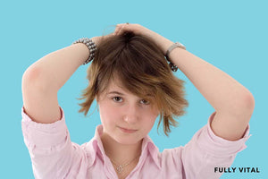 Woman holding short shag haircut