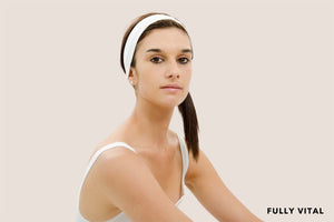 Woman wearing white headband