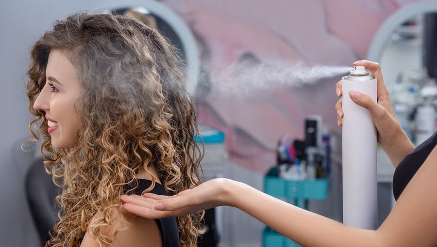 is hairspray bad for your hair image of woman